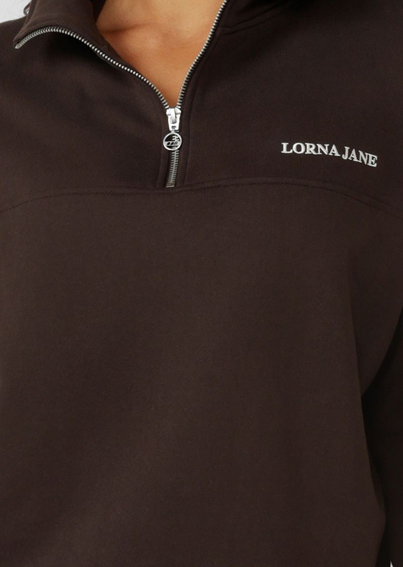 Versatile Relaxed Fit Layering Piece
1/4 Zip Front Closure
Transseasonal Cotton Terry Fabric
Elevated Logo Embroidery