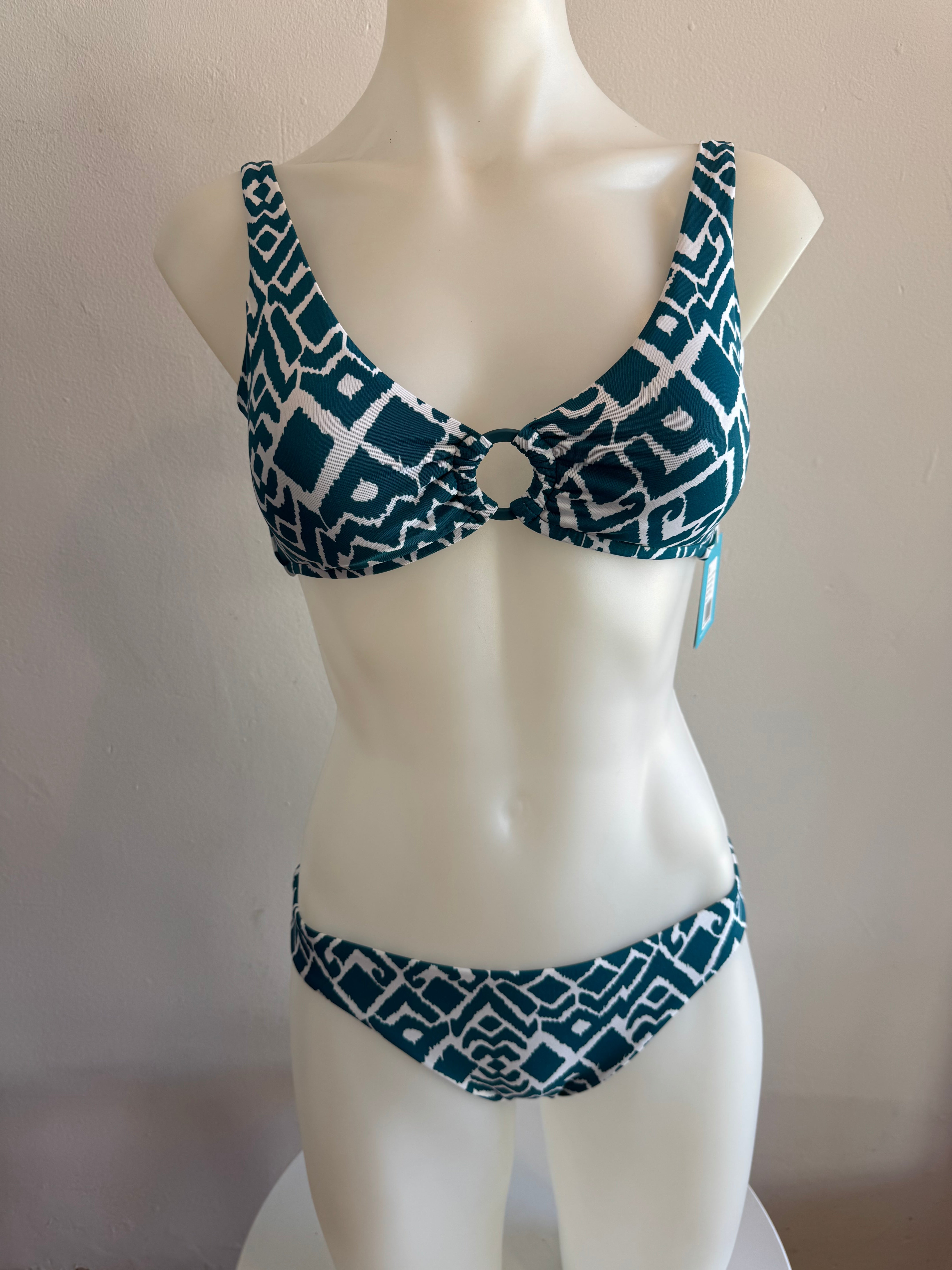 La Selva, is our captivating Ikat print that blends traditional craftsmanship with modern flair. This geometric design features intricate patterns, masterfully woven into shapes that evoke the untamed beauty of the jungle, making La Selva the perfect choice for swimwear that stands out with timeless elegance and a touch of adventurous spirit. Dive into style with La Selva, where tradition meets trend.