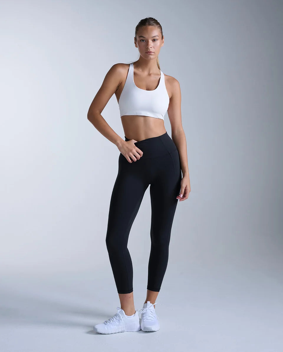 The buttery smooth Fluid Hi-Rise 7/8 Tights contour through the waist and hips for sculpted support that bends, stretches, and moves with you. The versatile cut and V-back shaping create a smooth, flattering silhouette for every