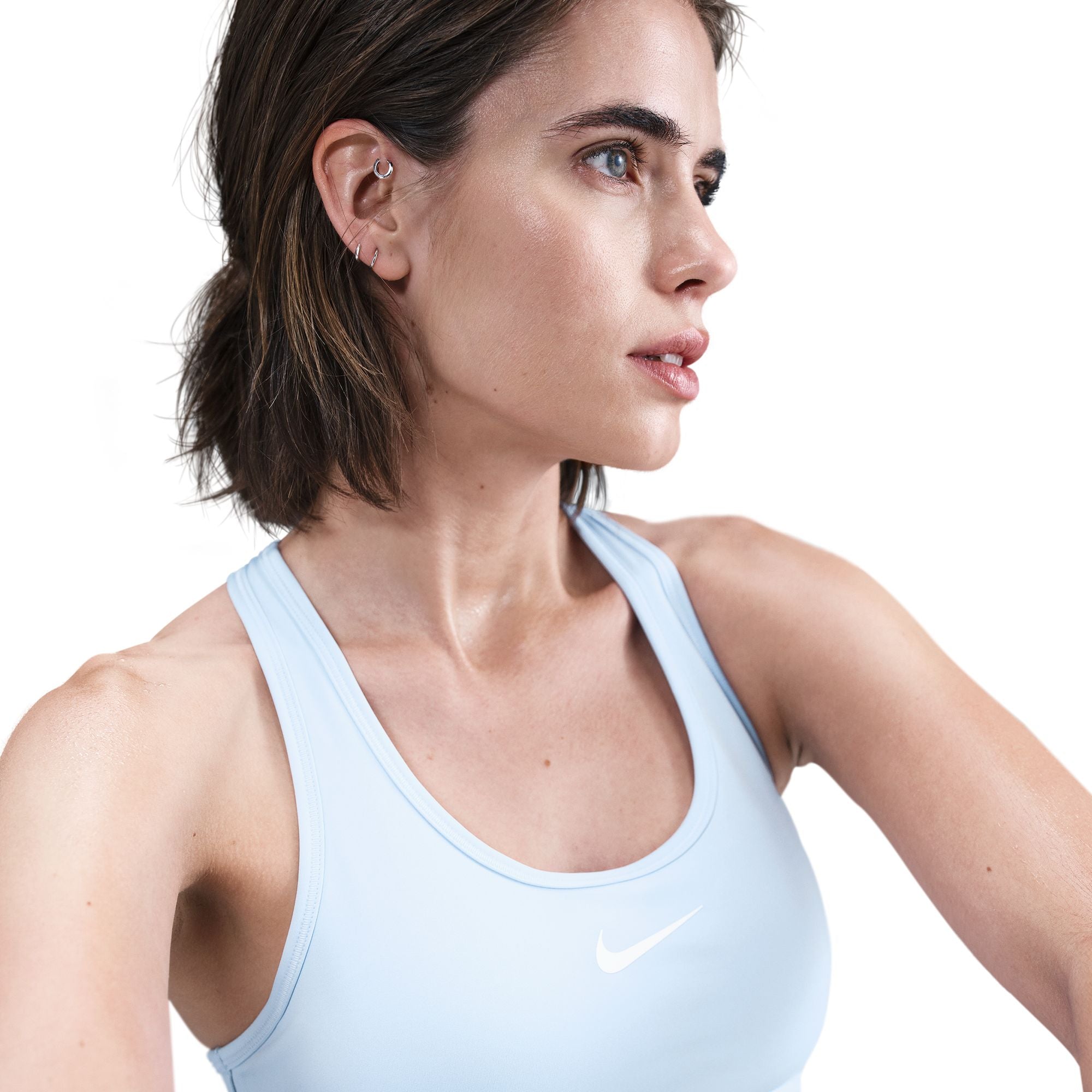 Nike Swoosh Medium Support
Women's Padded Sports Bra
You're on the move. Your padding shouldn't be. This Swoosh bra's sewn-in pads stay in place so you can work hard without worrying about them shifting or folding. Great for training workouts and dance classes, medium support gives you a snug hold that helps keep everything in place. Plus, sweat-wicking, adaptive material quickly recovers its shape so you can stay comfortable throughout your workout.