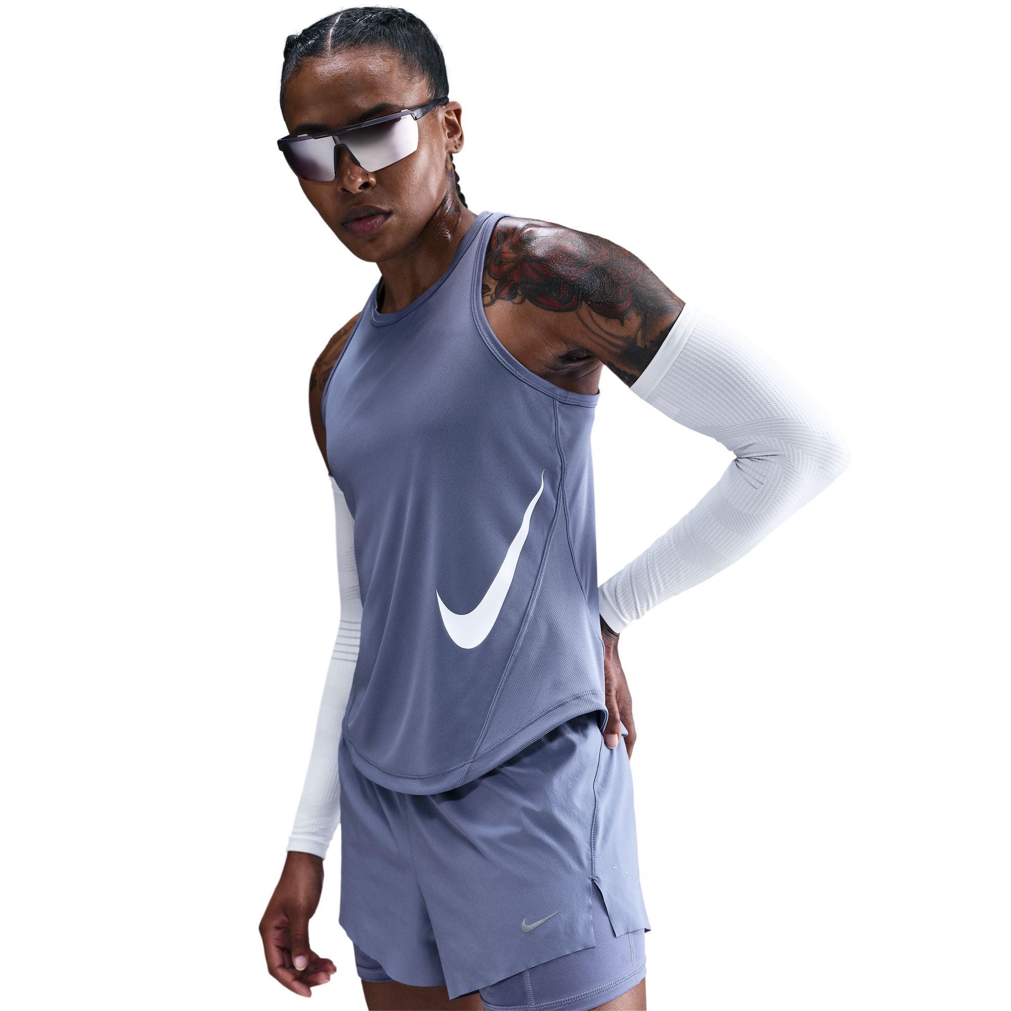 Dri-FIT Running Tank Top
Pick up your pace in this sleek, sweat-wicking Tempo tank top. It tapers around the waist and has a curved hem that gives you coverage through your stride, making for a comfortable, distraction-free run