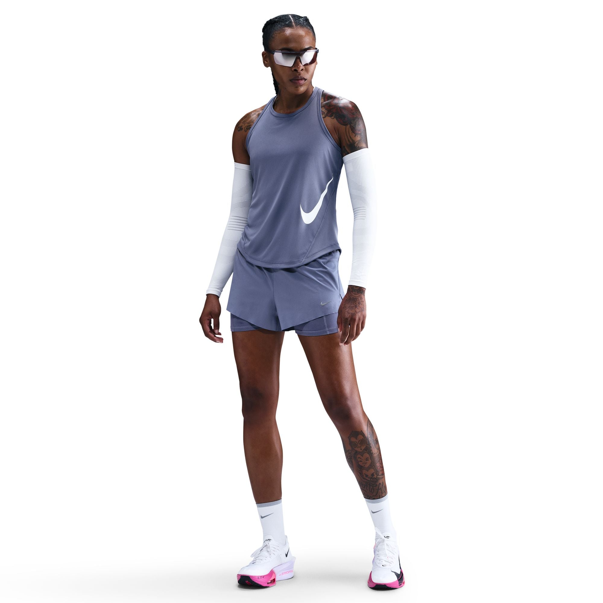 Dri-FIT Running Tank Top
Pick up your pace in this sleek, sweat-wicking Tempo tank top. It tapers around the waist and has a curved hem that gives you coverage through your stride, making for a comfortable, distraction-free run