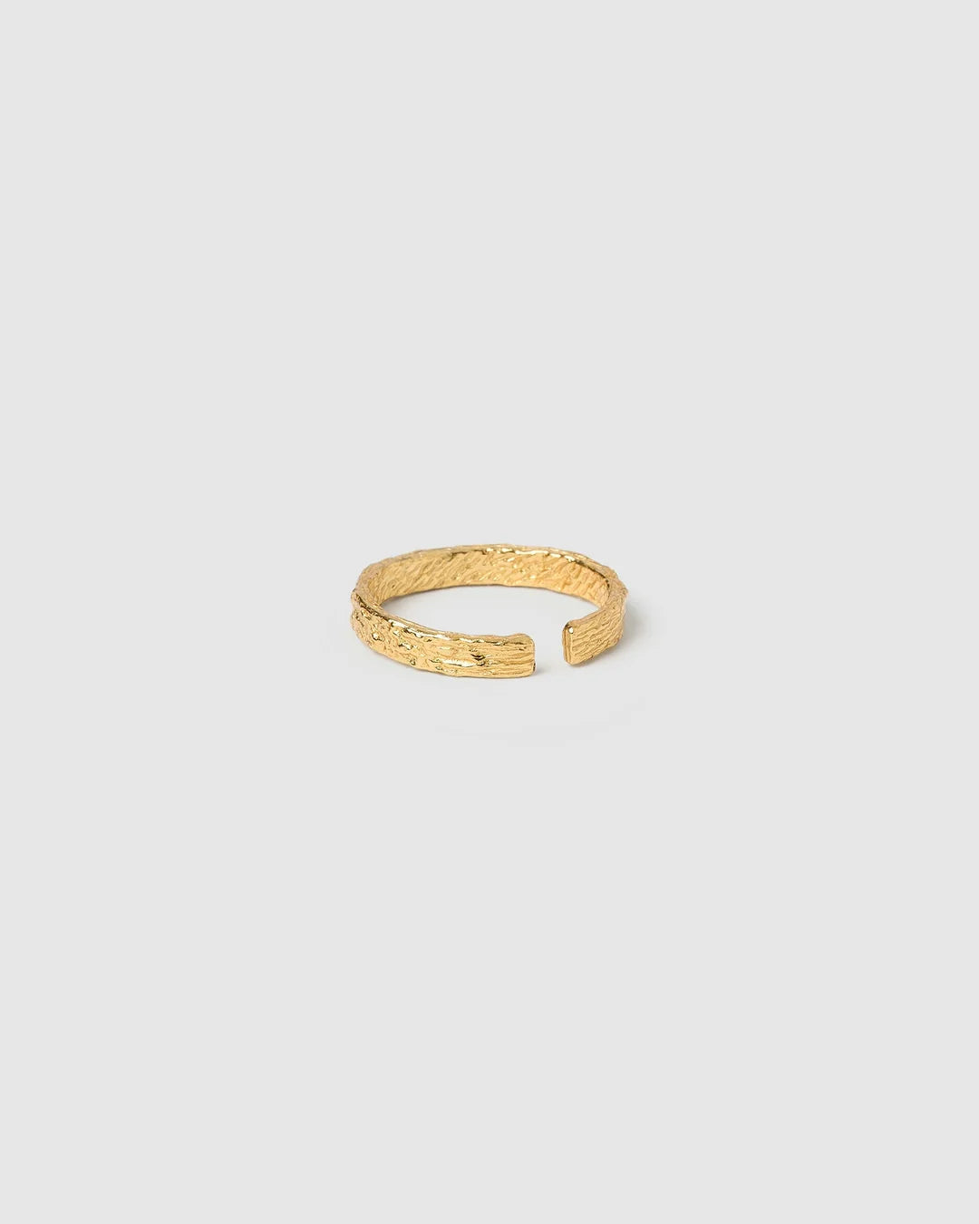 The Small Eros Textured Ring is a true beauty, both to wear and to style. With its shimmering textured surface and sleek design, it's the perfect piece to elevate your ring stack.