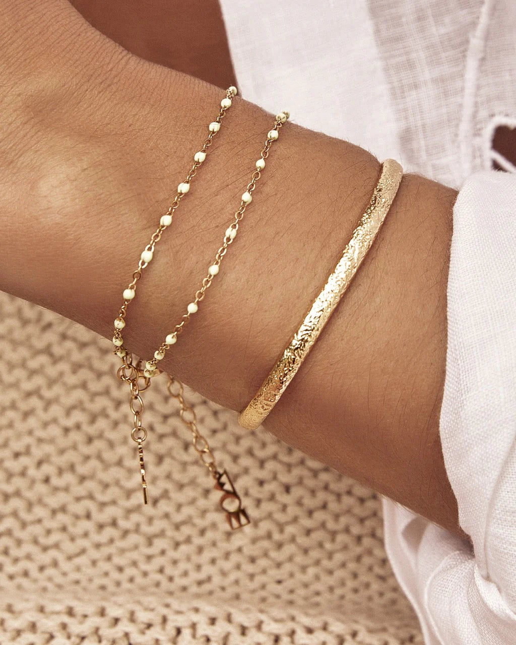 showcasing a stunning crushed gold texture, the Stevie Cuff is designed to turn heads. With its delicate silhouette, classic rounded edges, and slightly malleable fit, this dainty yet striking cuff brings effortless elegance to any jewellery collection.