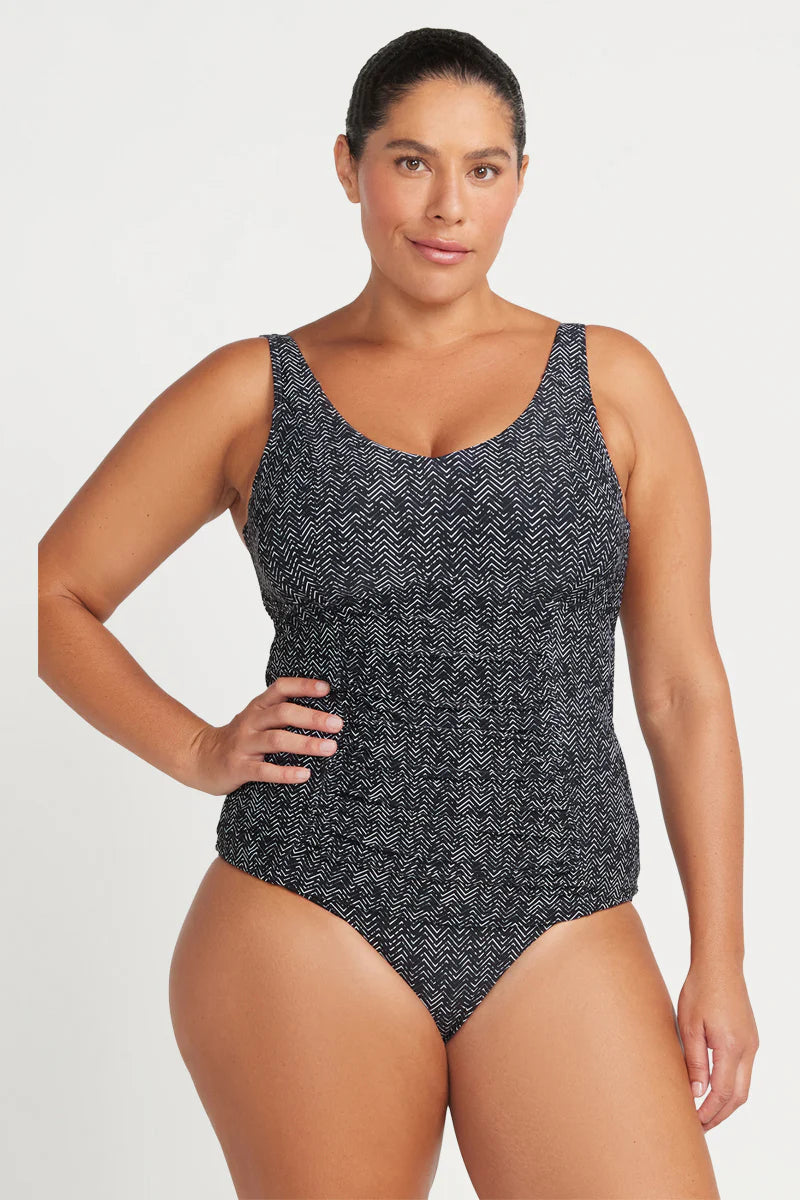 Artesands Fits Your Curves. Raphael is our full support swimsuit style with all the bells and whistles. This curve fit and plus size tankini top has underwire support to fit a E cup to F cup. This swimsuit has an internal bra fitting, and full body 360 degree powermesh for body sculpting confidence. Our curve fit and plus size tankini tops are a long line to avoid the fabric riding up when you're in the water.