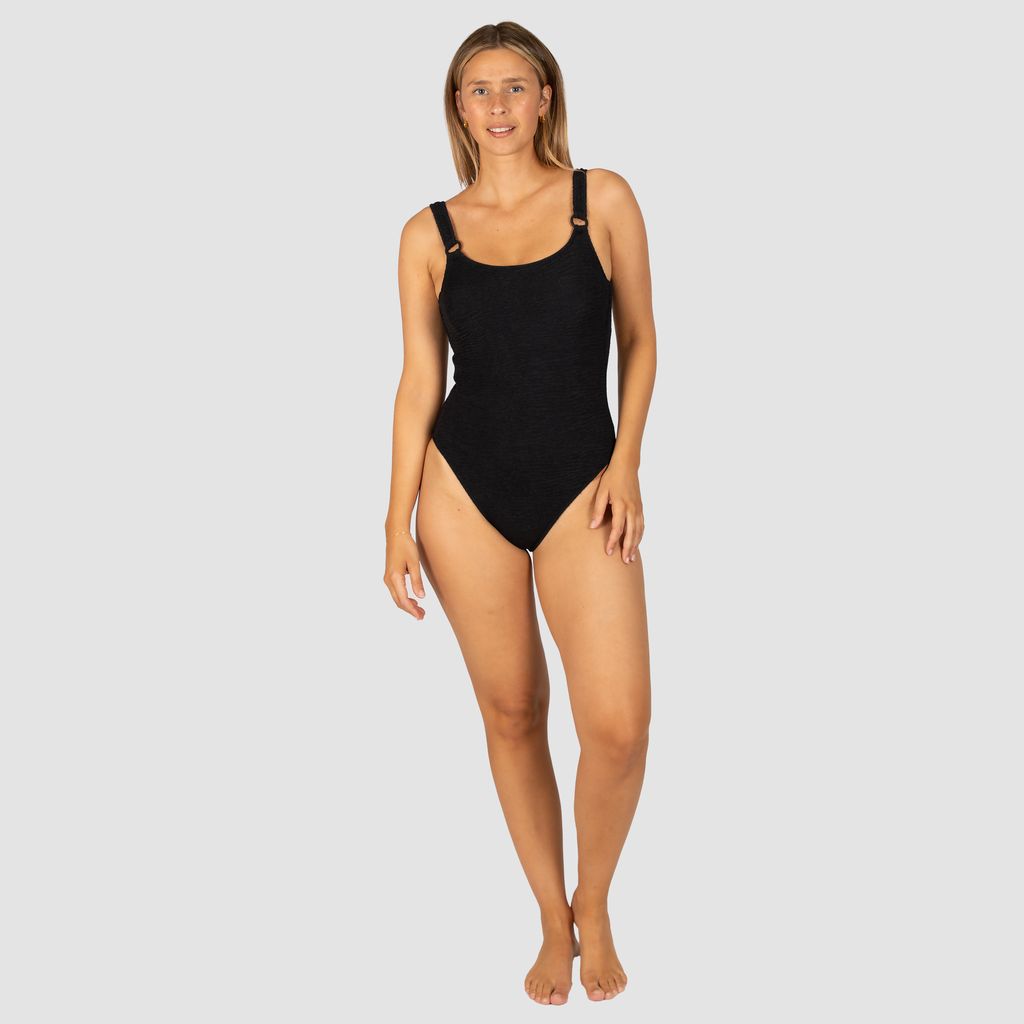 Baku's D/E Cup Underwire One Piece Swimsuit features a flattering hidden underwire, shelf support, flattering low scoop back, fully lined and ring detailing. Baku's exciting new solid Ibiza is crafted from a vibrant and dynamic crinkle fabric with a tactile texture, made in Italy.