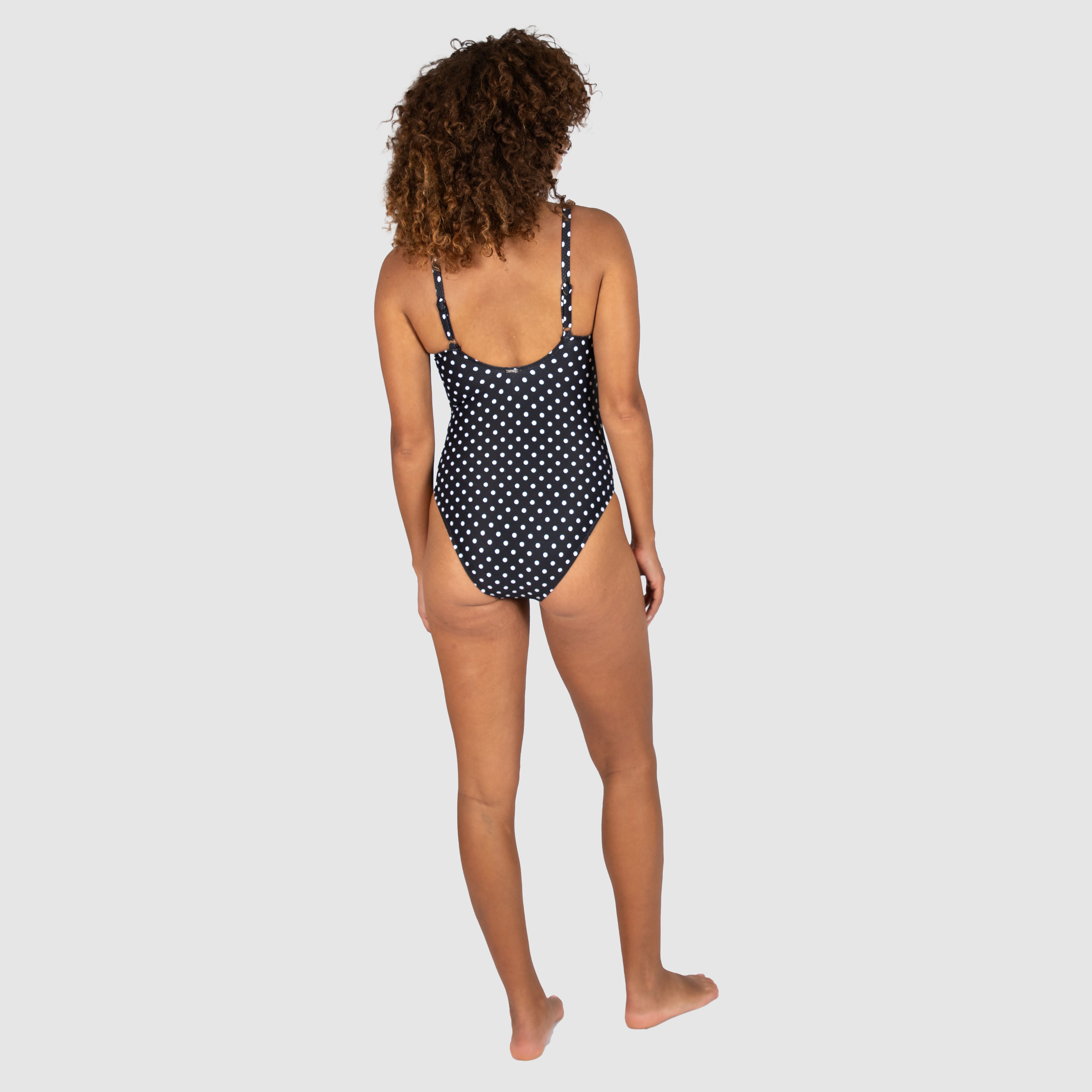 Baku's Parisian Summer Retro One Piece Swimsuit features a flattering ruched bust detail, adjustable straps, and is fully lined.
Embrace timeless elegance with Parisian Summer, a charming vintage polka dot that channels the effortless sophistication of Parisian fashion. Perfect for sun-soaked getaways or leisurely afternoons by the water.