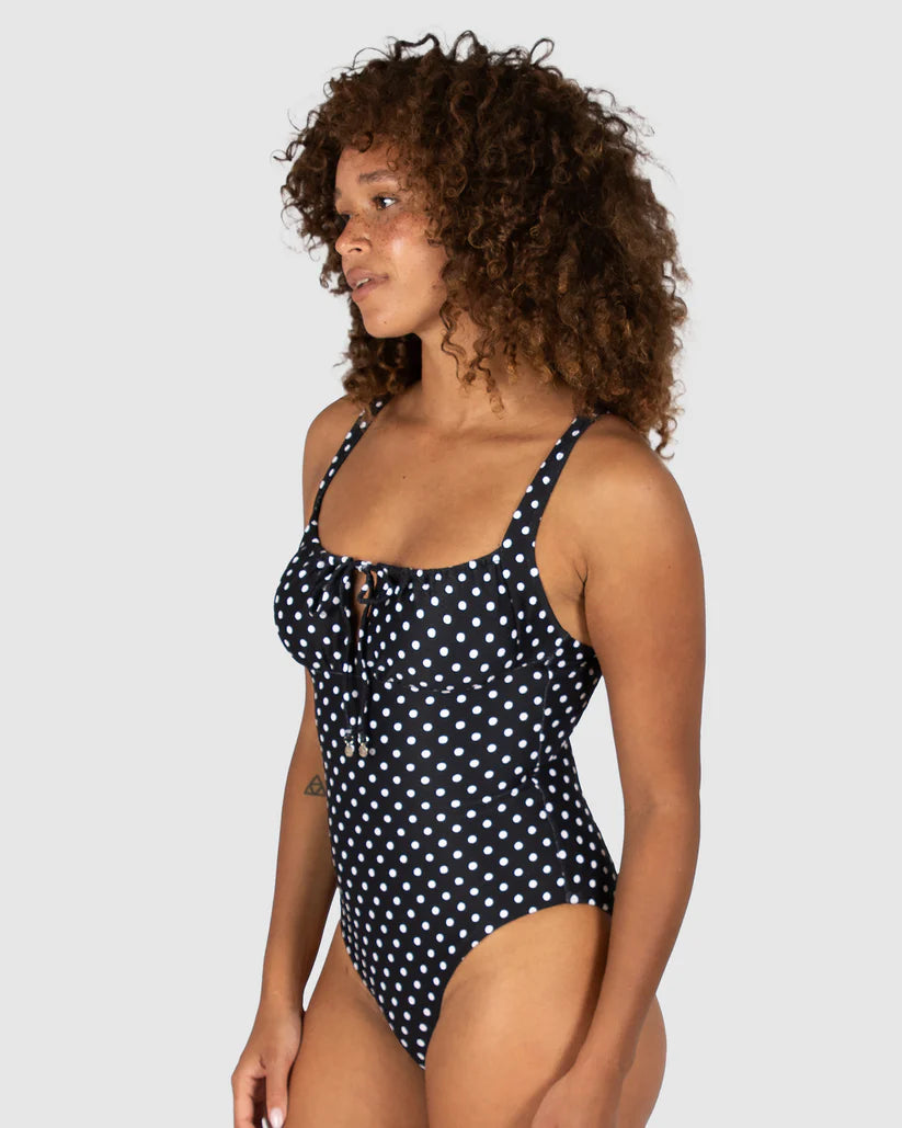 Baku's Parisian Summer Retro One Piece Swimsuit features a flattering ruched bust detail, adjustable straps, and is fully lined.