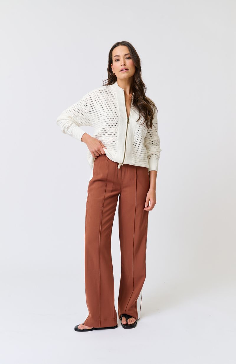 Knit bomber style zip through jacket
Open pointelle knit pattern
Ribbed neck, hemline, sleeve cuffs and zipper placket
Dropped shoulder with long sleeves
Designed to be turned up at the hem for a relaxed look
75% viscose, 25% polyester knit fabric
