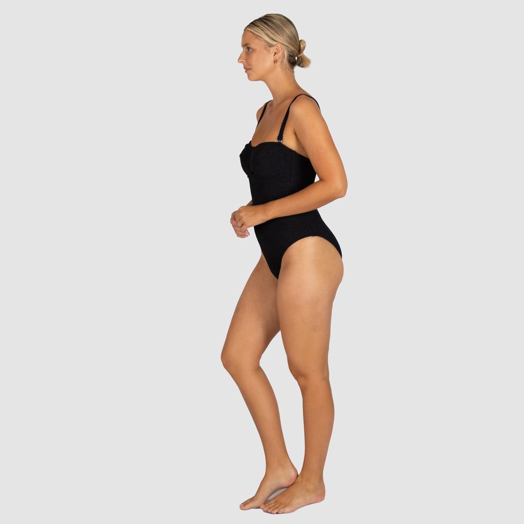 Hidden underwire and boning support for added structure
Removable and adjustable straps for versatile styling
U-trim detailing at the front
Removable soft cups
Fully lined
Gripper elastic for a secure fit
Crinkle Fabric
Fabric: 93% Polyamide / 7% Elastane
Fabric: Made in Italy
Designed and Made in Australia