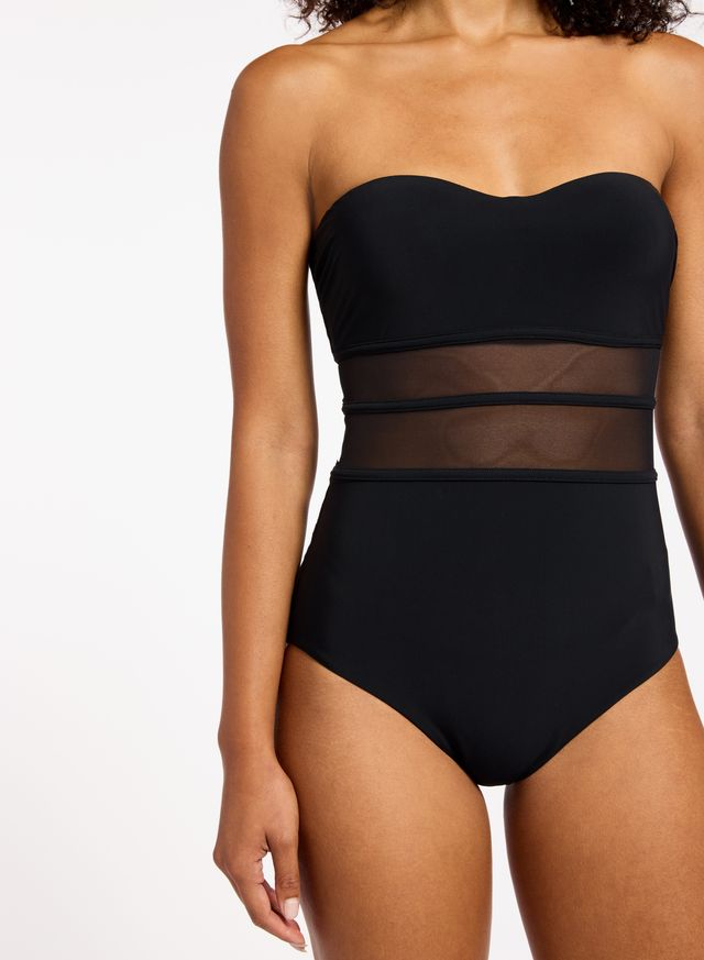 Recycled matte fabric base.
Best suited to an A - C cup.
Moulded cups for shape and support.
Side boning for shape definition.
Internal shelf bra for bust support.
Regular leg, regular back coverage.
73% Recycled Nylon 27% Elastane