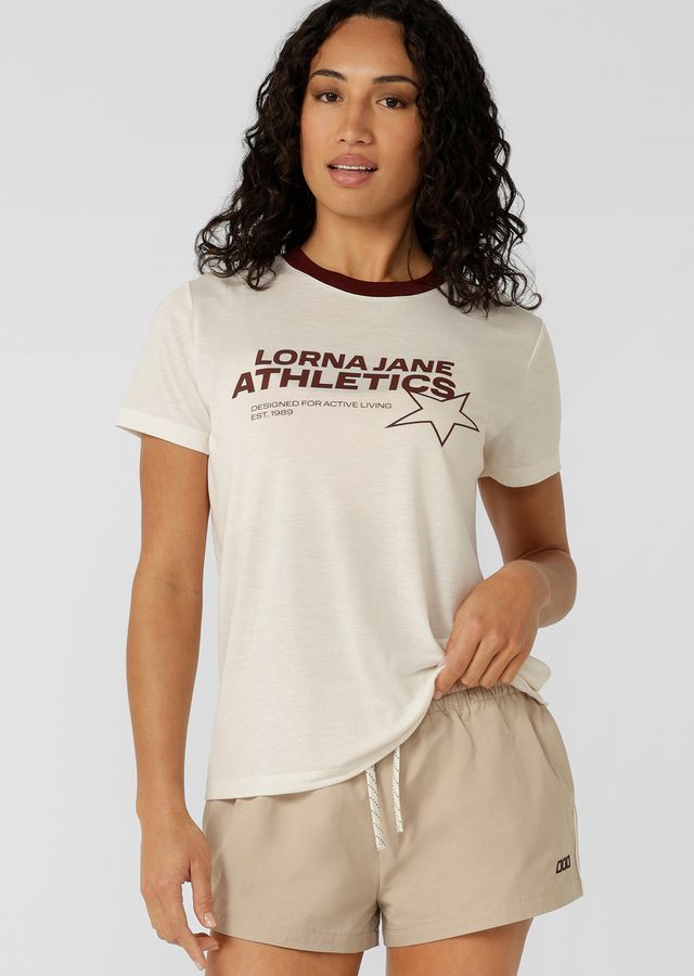 Versatile Wear Anywhere Classic Design
Neat Fit Silhouette - If you love our Lotus T-Shirt, You'll love this fit!
Exclusive Elevated Logo Print
Soft Touch Viscose Blend Fabric
Sporty Contrast Rib Crew Neckline