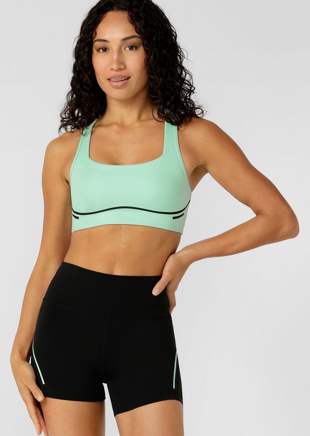 Compressive Underbust Band with Back Adjustability provides High Support
Racerback Design that Clears the shoulder blades for Unrestricted movement
Hidden Bounce Resistant Lining
Open Back Design with Mesh Panelling for Added Ventilation
Form Flattering Contrast Design Lines that Contour Your Curves