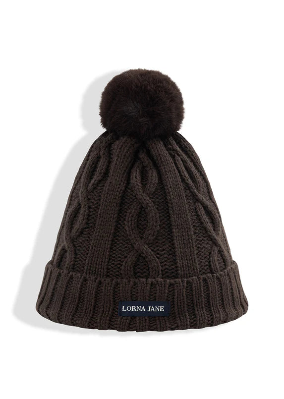 Elevated Cable Knit Design
Cosy Teddy Lining Keeps Your Head & Ears Warm
Snug and Comfortable Fit with Ear Coverage
Premium Woven Logo Patch