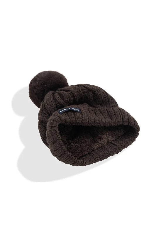 Elevated Cable Knit Design
Cosy Teddy Lining Keeps Your Head & Ears Warm
Snug and Comfortable Fit with Ear Coverage
Premium Woven Logo Patch