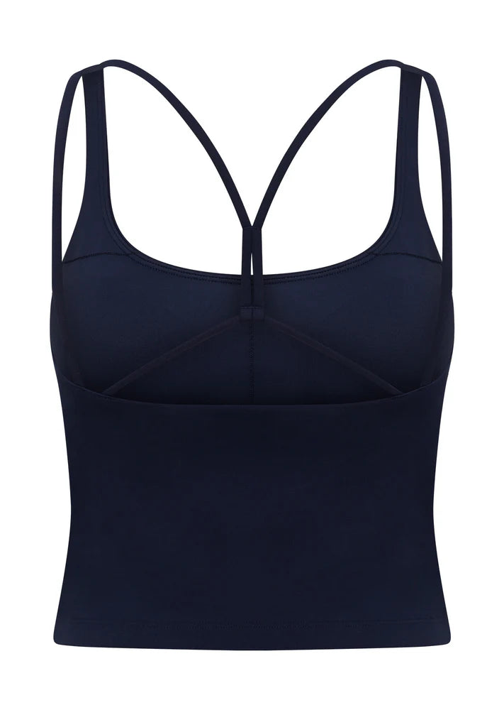 Internal Bra with Removable Padding for All Day Support
Intricate Strappy Back Design
Moisture Wicking Bare Minimum Fabrication for that Barely There Feeling
Form Flattering Slightly Cropped Silhouette
LJ Rubber Logo Badge