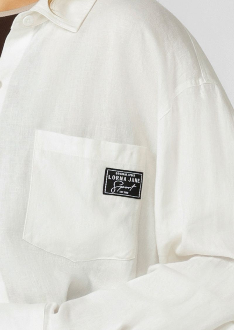 Effortless Relaxed Fit Silhouette with Curved Hem
Button Through Opening and Sleeve Cuffs (+ a Spare)
chest pocket to stash your essentials
Limited Edition Logo Patch