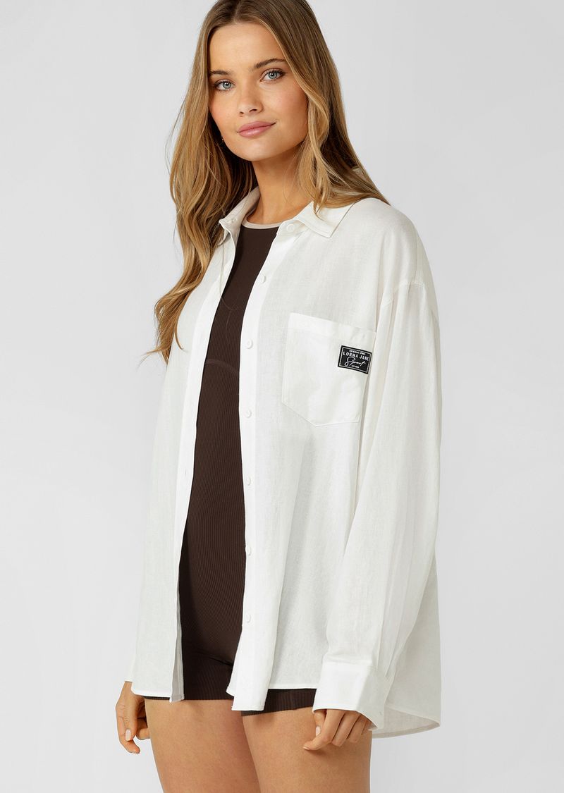 Effortless Relaxed Fit Silhouette with Curved Hem
Button Through Opening and Sleeve Cuffs (+ a Spare)
chest pocket to stash your essentials
Limited Edition Logo Patch