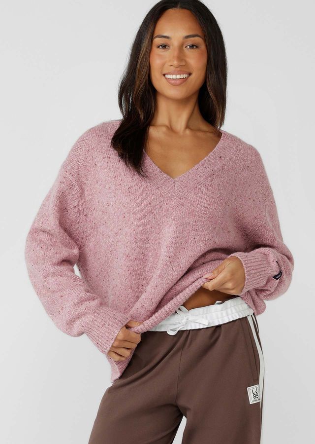 Flattering Relaxed Fit V-Neck Silhouette
Premium True Knit Wool Blend Fabrication in an Elevated Marl Look
Classic Ribbed Cuffs and Hemline