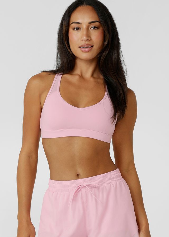 Crafted in sweat wicking Nothing 2 See Here™ fabric, it features a compressive underbust band for high support and a racerback silhouette that clears the shoulder blades for unrestricted movement. Mesh panelling enhances airflow, while the form flattering V shaped neckline balances strength with style.