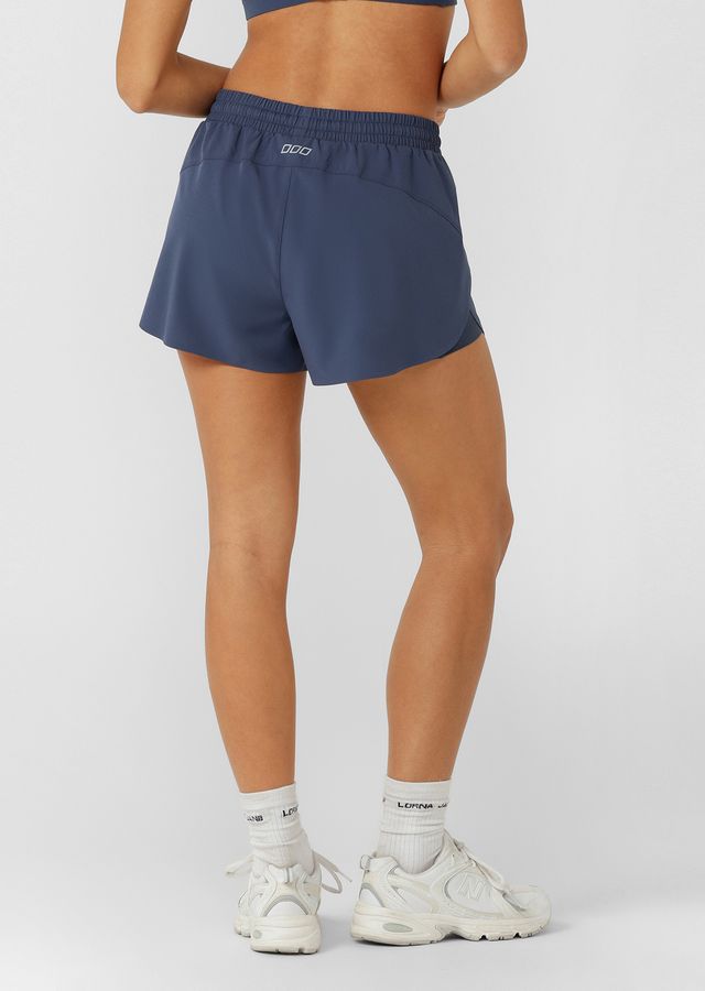 Lightweight Sweat Wicking Shorts Fabrication
Anti-Chafe Compressive and Supportive Internal Shorts Lining
Side Phone Pocket in Internal Shorts Avoids Bounce
Light As Air Bonded Hem Finish and Side Splits for Unrestricted Movement
Reflective Icons Logo + Reflective LJ Rubber Badge
Relaxed Fit