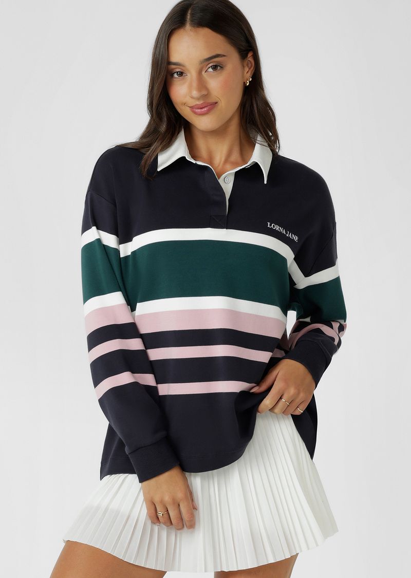 Relaxed Fit
Elevated Yarn Dye Striped Design in a Soft Touch Cotton Fabrication
Rugby Jersey Inspired Design with Contrast Collar and Concealed Button Through Placket
Logo Embroidery
