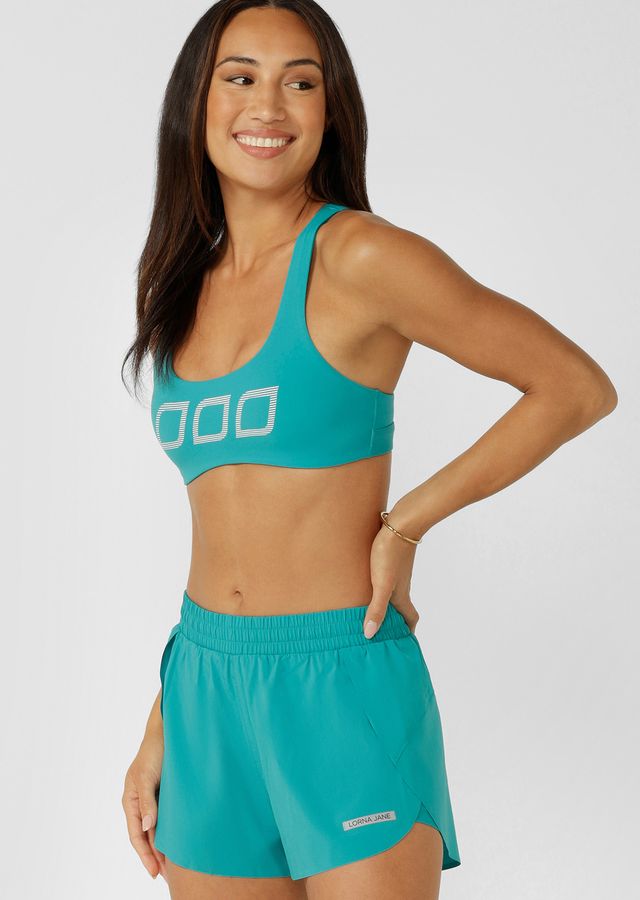 Support Cross Back Straps and Adjustable Underbust Band provides High Support
Keyhole Back Design for Added Ventilation
Hidden Bounce Resistant Lining
Form Flattering Curved Underbust Silhouette
Iconic Logo