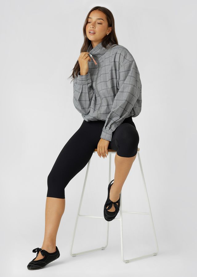 Neat Fit Bomber Inspired Silhouette with High Athletic Neckline and Zip Front Closure
Soft Touch Cotton Blend Fabrication in a classic Grey Mini Check Design
Side Pockets to Stash your Essentials
Adjustable Sleeve Cuffs with Press Stud Closure to Trap in Warmth
Premium Faux Leather Logo Patch and Iconic Zip Puller