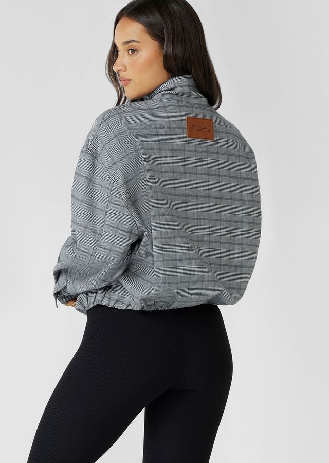 Neat Fit Bomber Inspired Silhouette with High Athletic Neckline and Zip Front Closure
Soft Touch Cotton Blend Fabrication in a classic Grey Mini Check Design
Side Pockets to Stash your Essentials
Adjustable Sleeve Cuffs with Press Stud Closure to Trap in Warmth
Premium Faux Leather Logo Patch and Iconic Zip Puller
