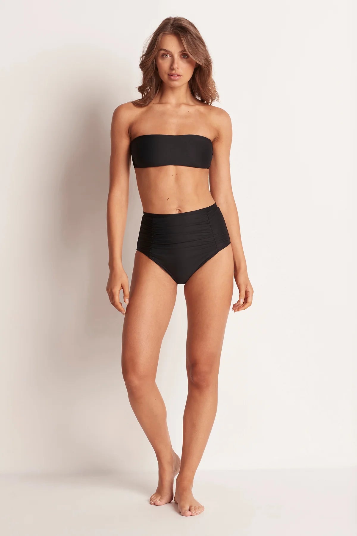 The ML Separates Classic High Waist Pant features a high waist with comfortable soft waistband, firm tummy support with soft gathers in front panels and lower leg line. High waist styling Front panels with soft gathers Powermesh front panel for tummy control Lower cut leg fuller bottom coverage Fully lined in our Recycled Body Sculpting silky touch lining
