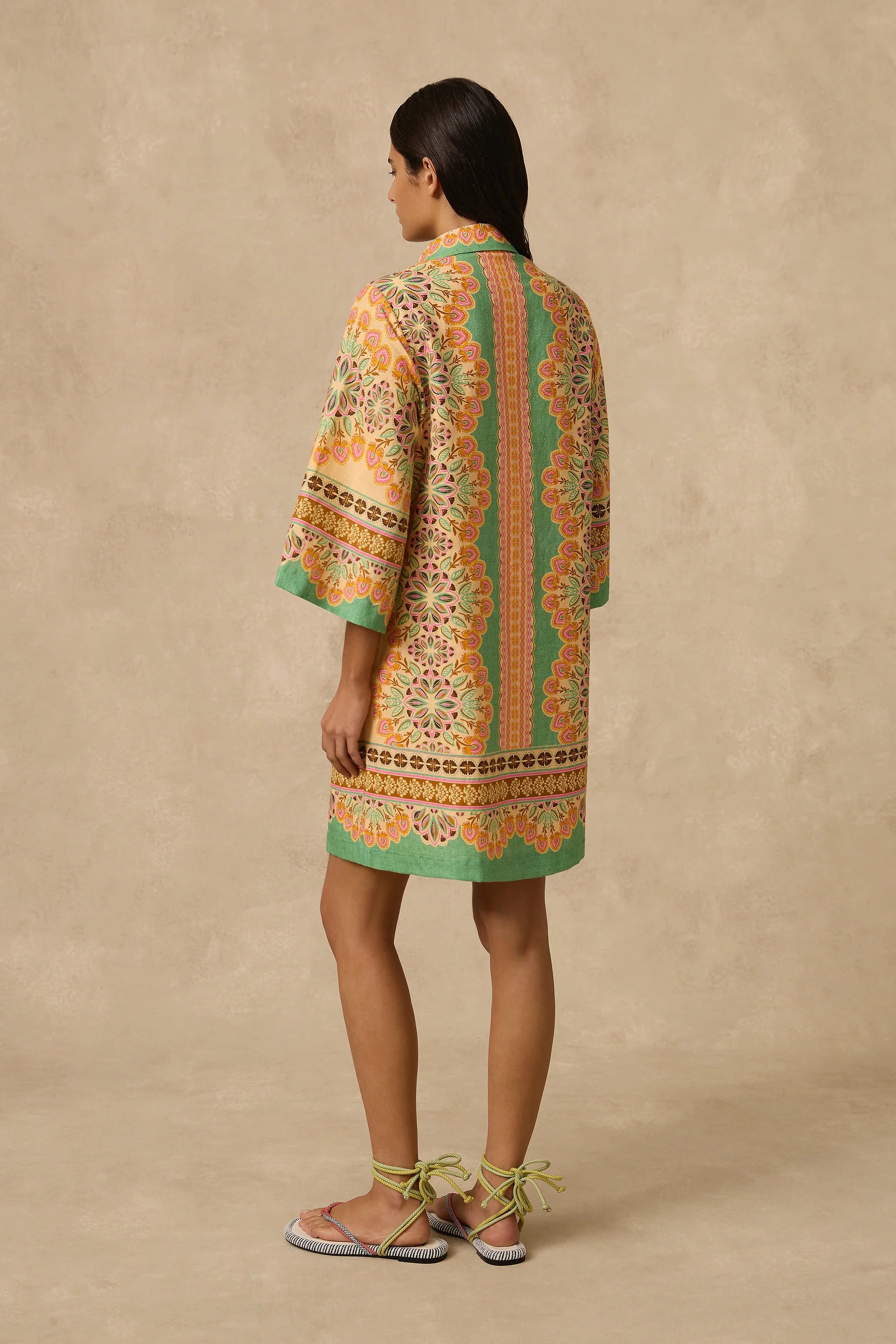 The Selma Shirt Dress is a linen mini shirt dress with a concealed front placket opening, classic collar, 3/4 length loose sleeves, placement print throughout and removable rope tie belt.