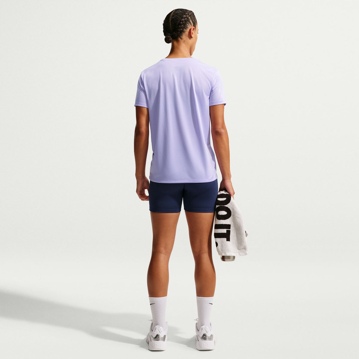 Nike Dri-FIT technology moves sweat away from your skin for quicker evaporation, helping you stay dry and comfortable.
The classic fit tee silhouette is relaxed through the body and hips.