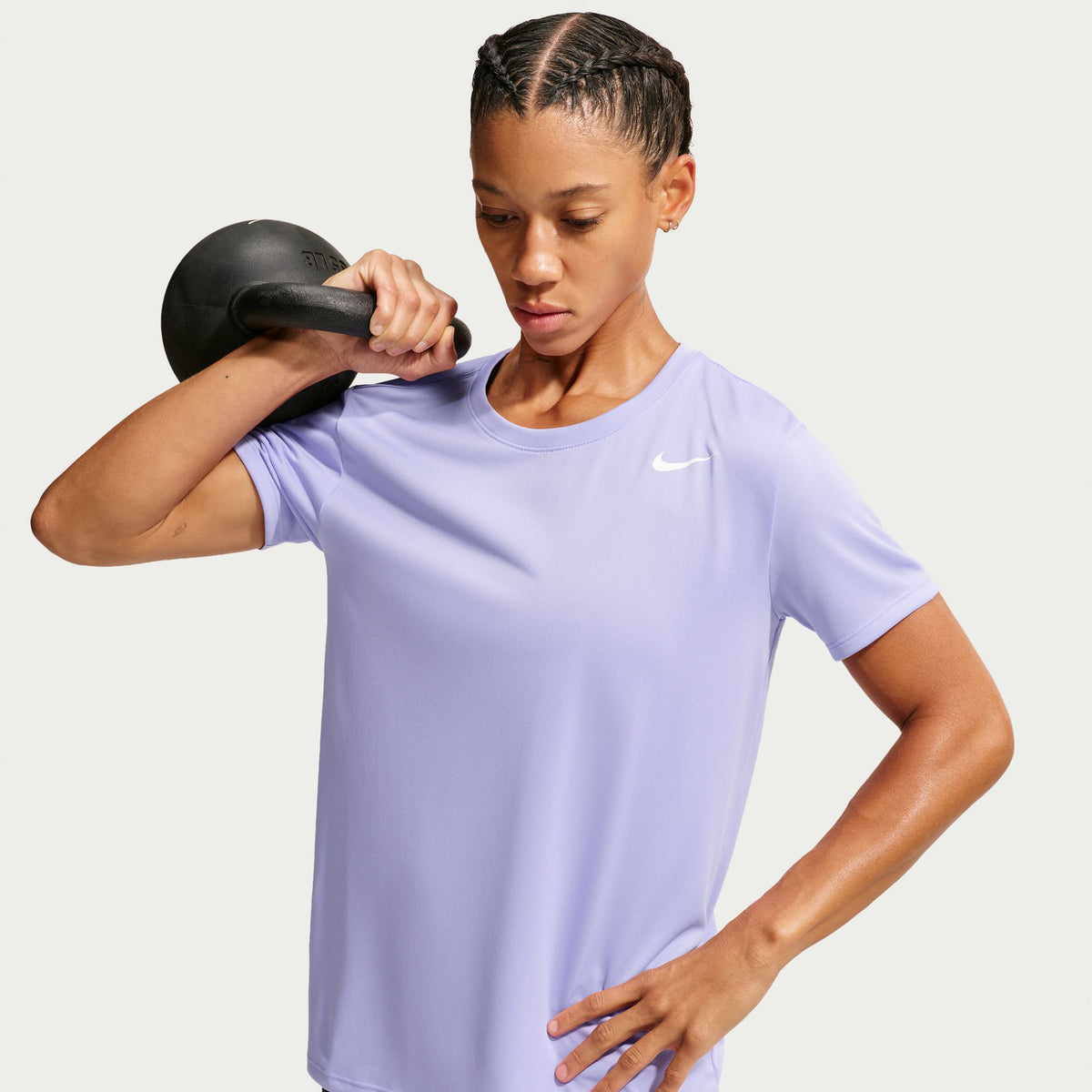Nike Dri-FIT technology moves sweat away from your skin for quicker evaporation, helping you stay dry and comfortable.
The classic fit tee silhouette is relaxed through the body and hips.