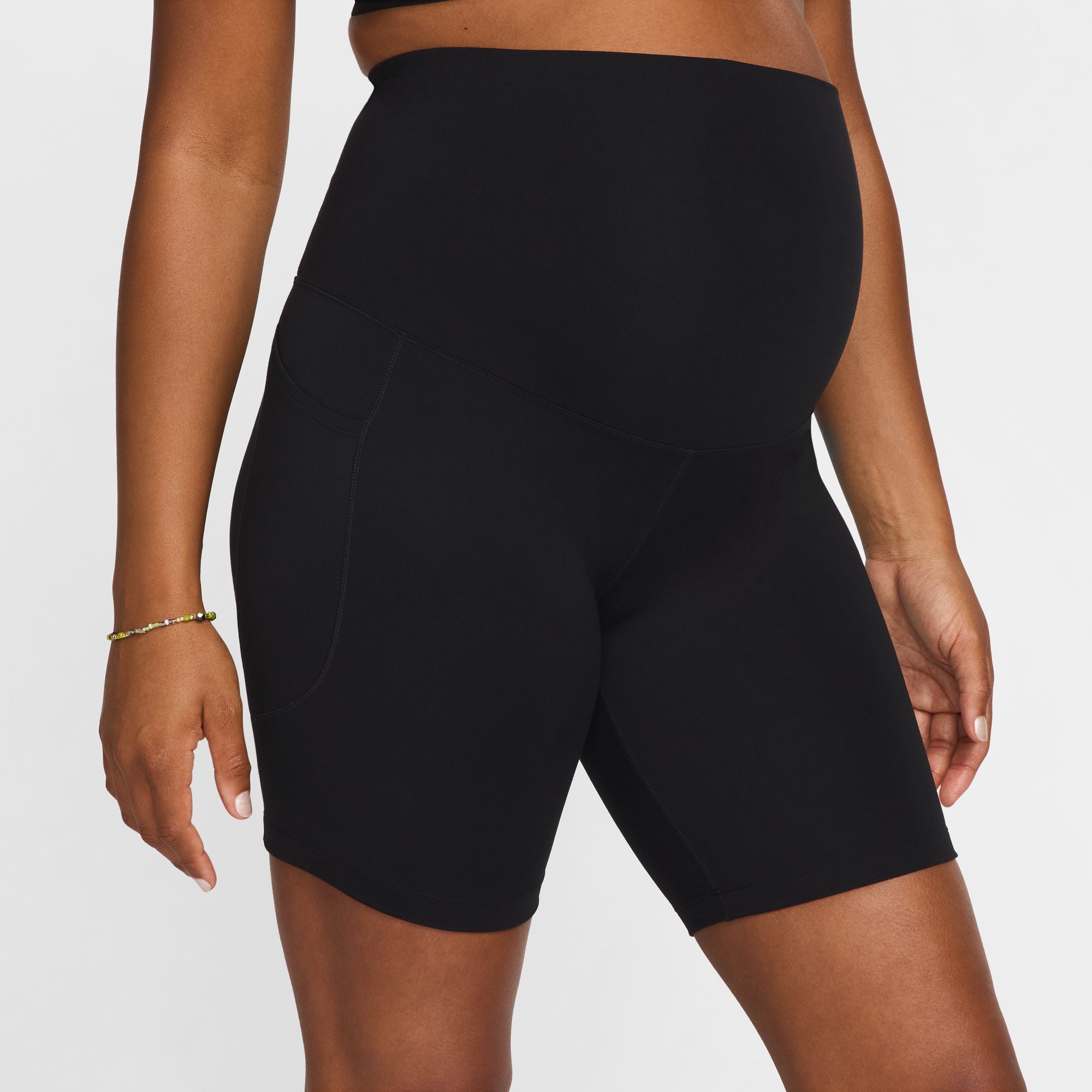Ready for your workout and the body temp fluctuations of pregnancy, Nike Dri-FIT technology moves sweat away from your skin for quicker evaporation, helping you stay dry and comfortable.