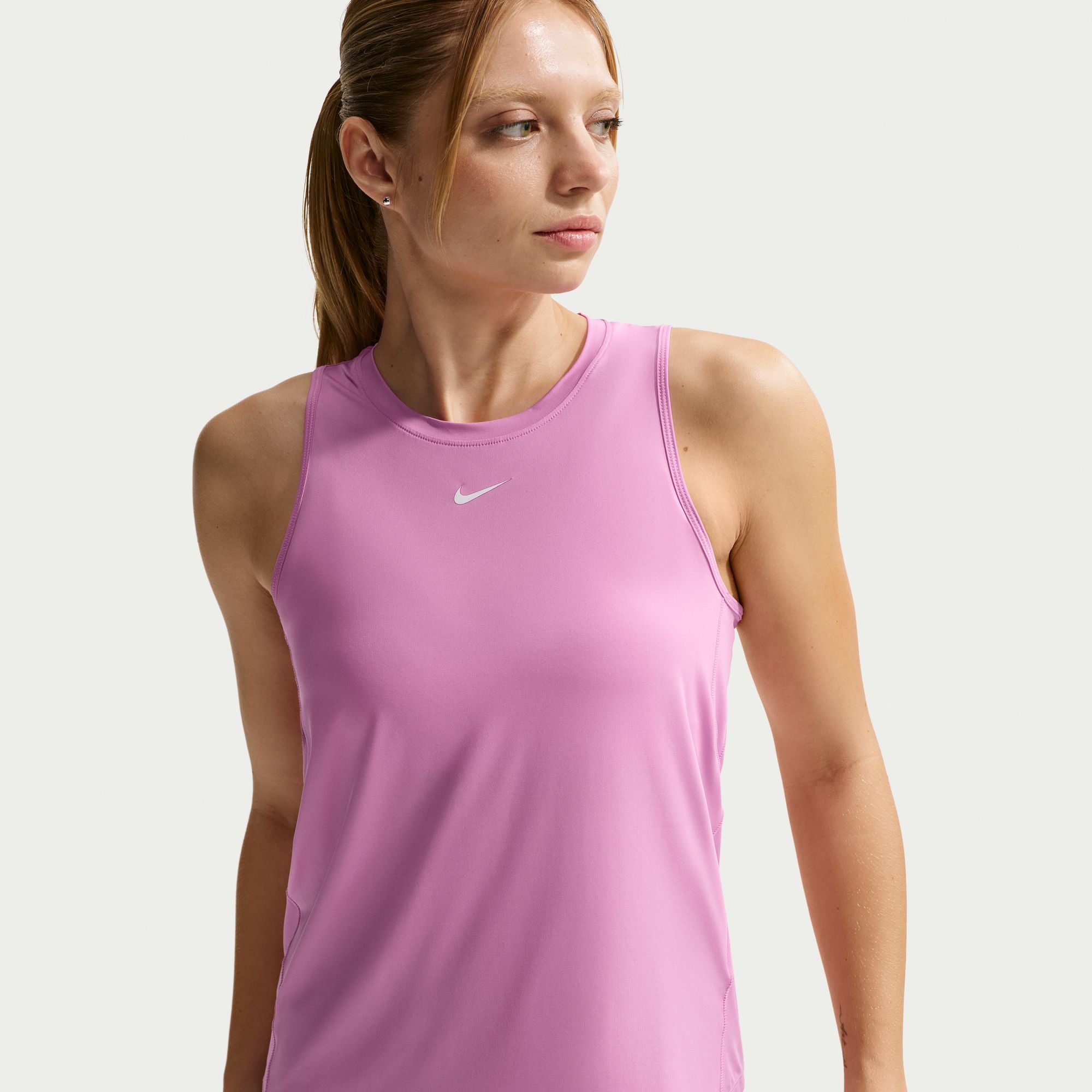 this Nike One Classic tank top is ready for whatever you are. Lightweight, silky-smooth fabric dries quickly and works for wherever your day takes you. A timeless, easy-fitting style and sweat-wicking tech