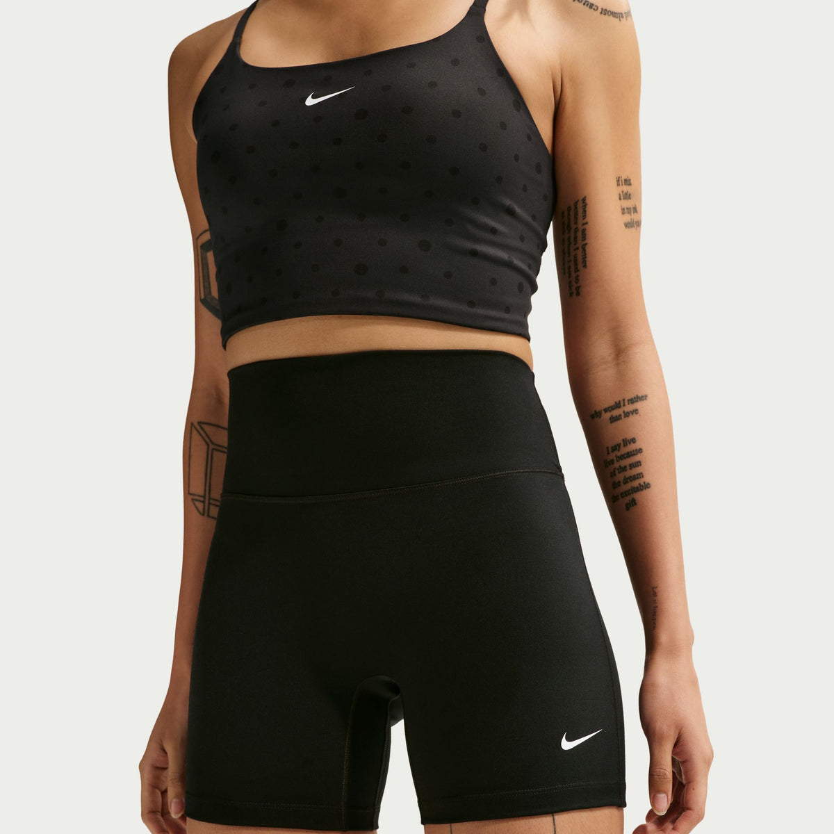 Nike Dri-FIT technology moves sweat away from your skin for quicker evaporation, helping you stay dry and comfortable.
Midweight, peachy-soft fabric stretches with your every move and dries quickly.
Absence of a front seam helps keep the fabric from riding up for a smooth fit.
Back pocket fits most phones.