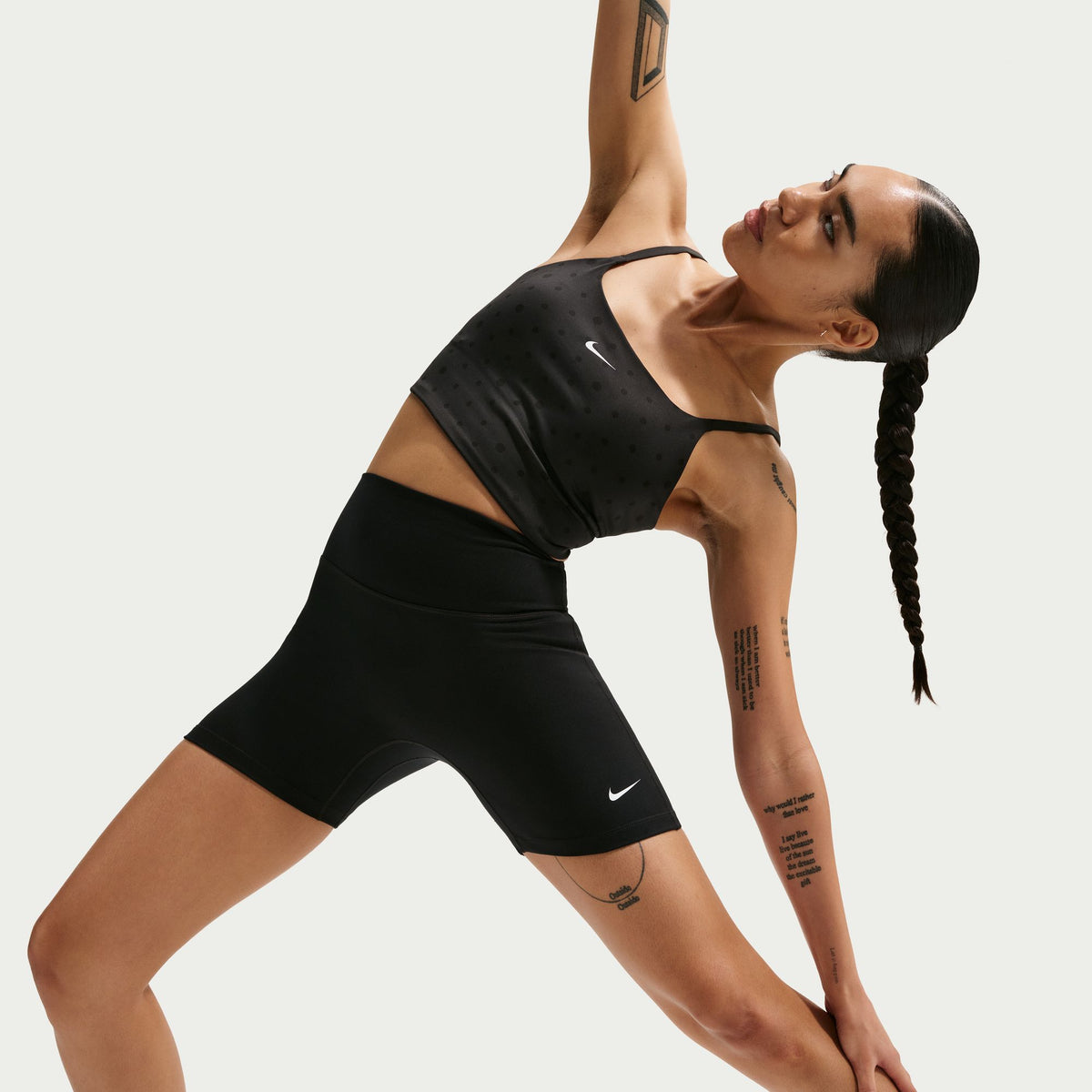 Nike Dri-FIT technology moves sweat away from your skin for quicker evaporation, helping you stay dry and comfortable.
Midweight, peachy-soft fabric stretches with your every move and dries quickly.
Absence of a front seam helps keep the fabric from riding up for a smooth fit.
Back pocket fits most phones.