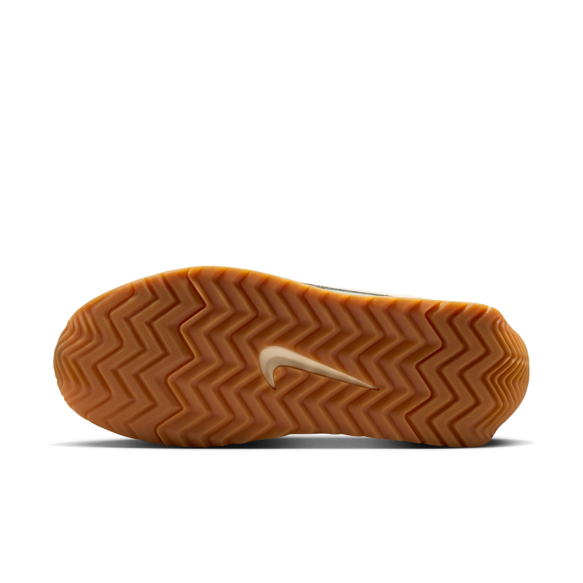 Leather and suede create a layered look that lasts.
Wide collar opening captures the proportions of '70s running style.
Herringbone gum sole with flex grooves provides grip from heel to toe.
