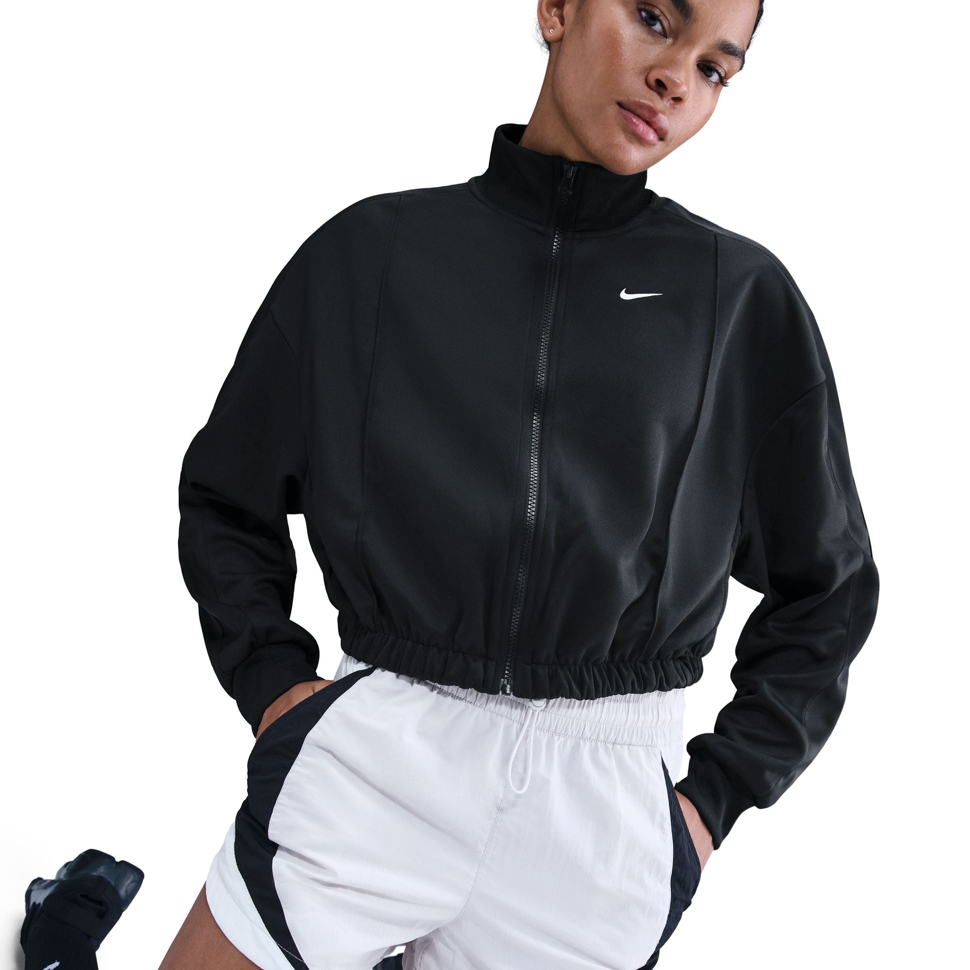 This classic track jacket is elevated through volume and drape. Elastic at your waist cinches in the oversized and slightly cropped silhouette.