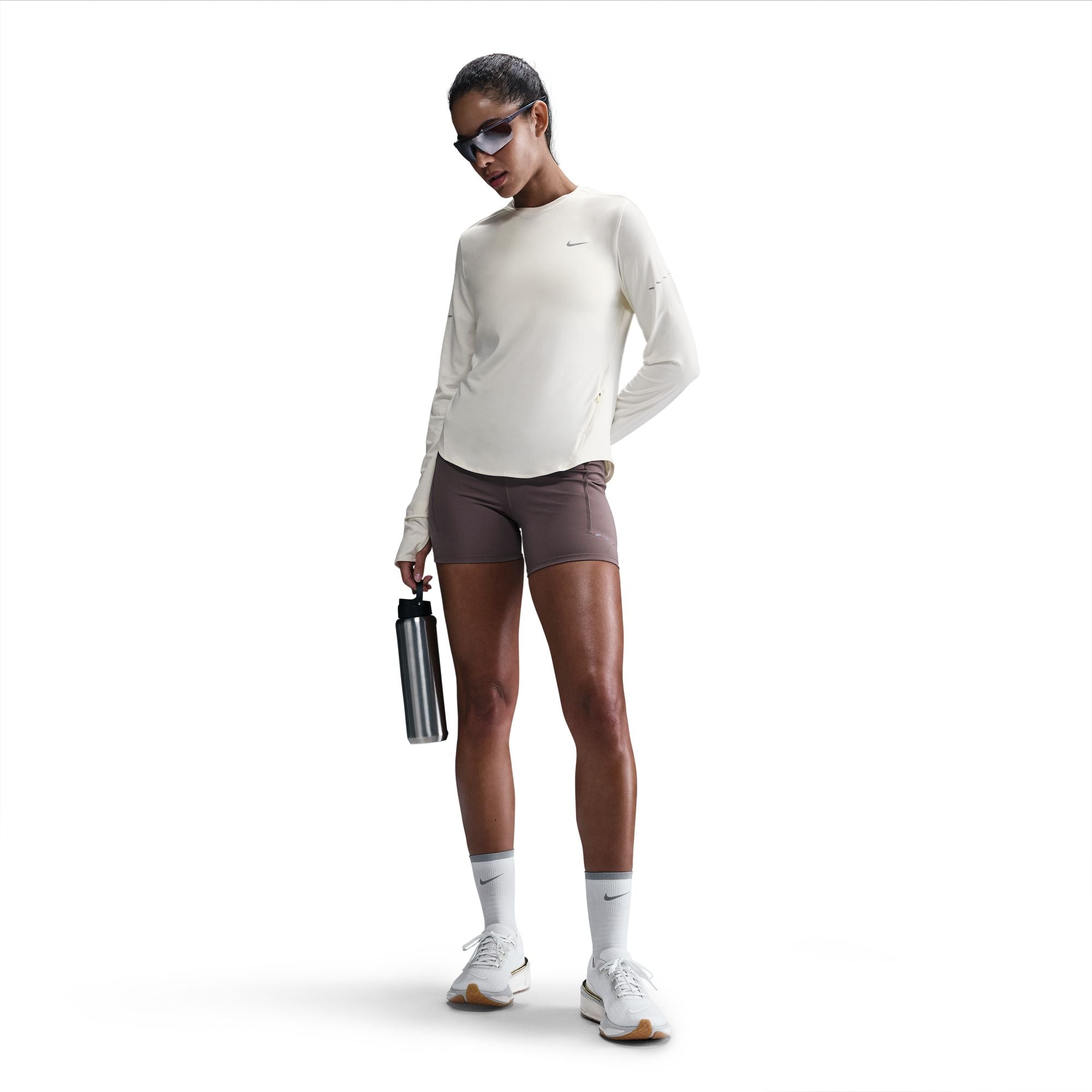Nike Swift
Women's Dri-FIT UV Long-Sleeve Crew-Neck Running Top
Using insights from runners like you, Nike prioritized functionality to refresh their Swift essentials. This lightweight top has been designed to help reduce chafing. It's soft, sweat-wicking and helps block out UV rays so you can focus on your miles, and nothing else.