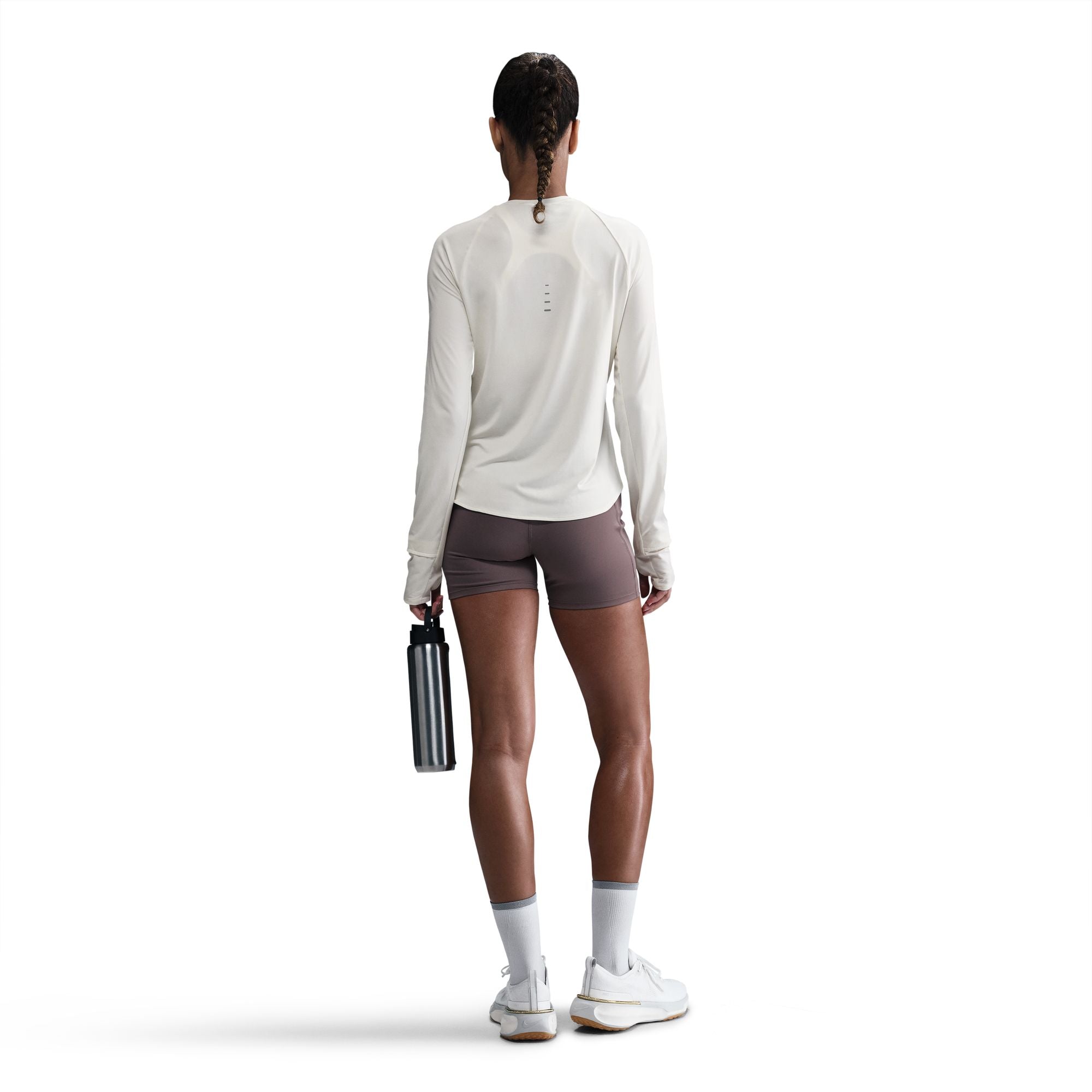 Nike Swift
Women's Dri-FIT UV Long-Sleeve Crew-Neck Running Top
Using insights from runners like you, Nike prioritized functionality to refresh their Swift essentials. This lightweight top has been designed to help reduce chafing. It's soft, sweat-wicking and helps block out UV rays so you can focus on your miles, and nothing else.