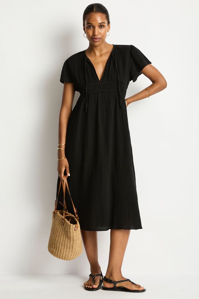 Cotton cheesecloth fabric
Soft touch fabric
V front neckline with tie
Elastic underbust panel
Short fluted sleeve
Maxi length