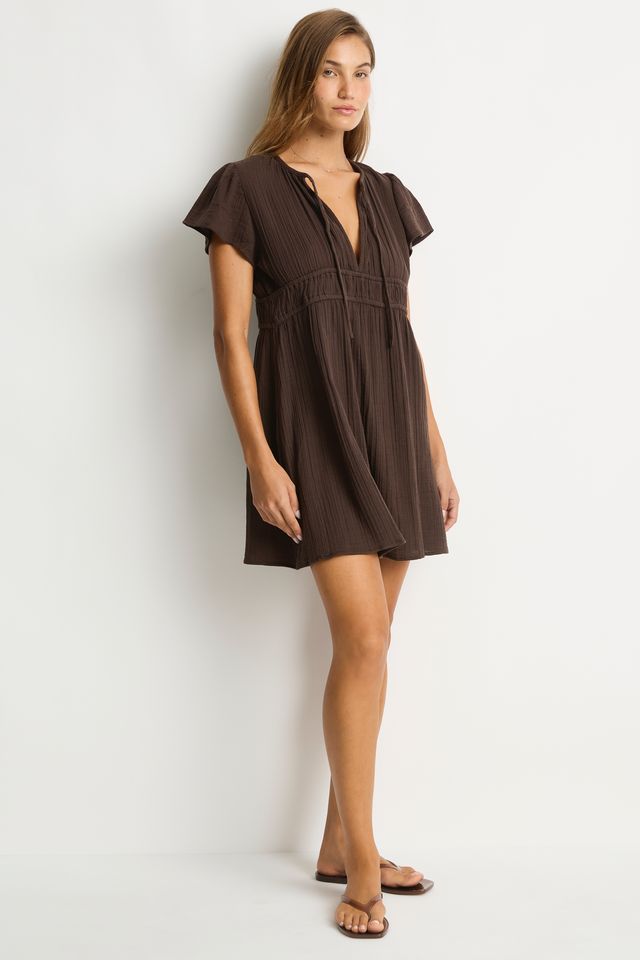 Cotton cheesecloth fabric
Soft touch fabric
V front neckline with tie
Elastic underbust panel
Short fluted sleeve
