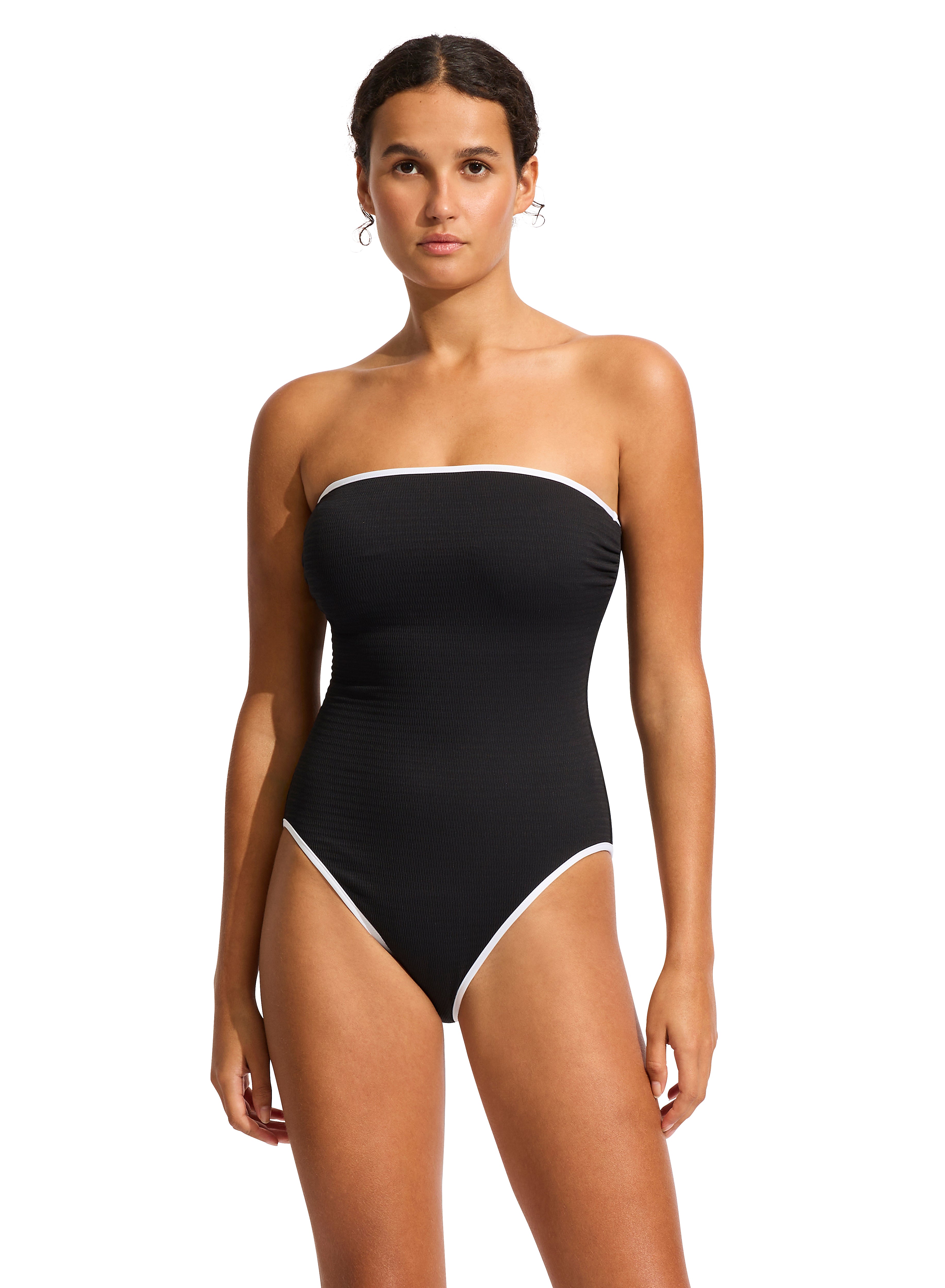 The DD Bandeau One Piece features an internal shelf bra, hidden underwire, gripper tape, removable & adjustable straps, high legline, contrast bin