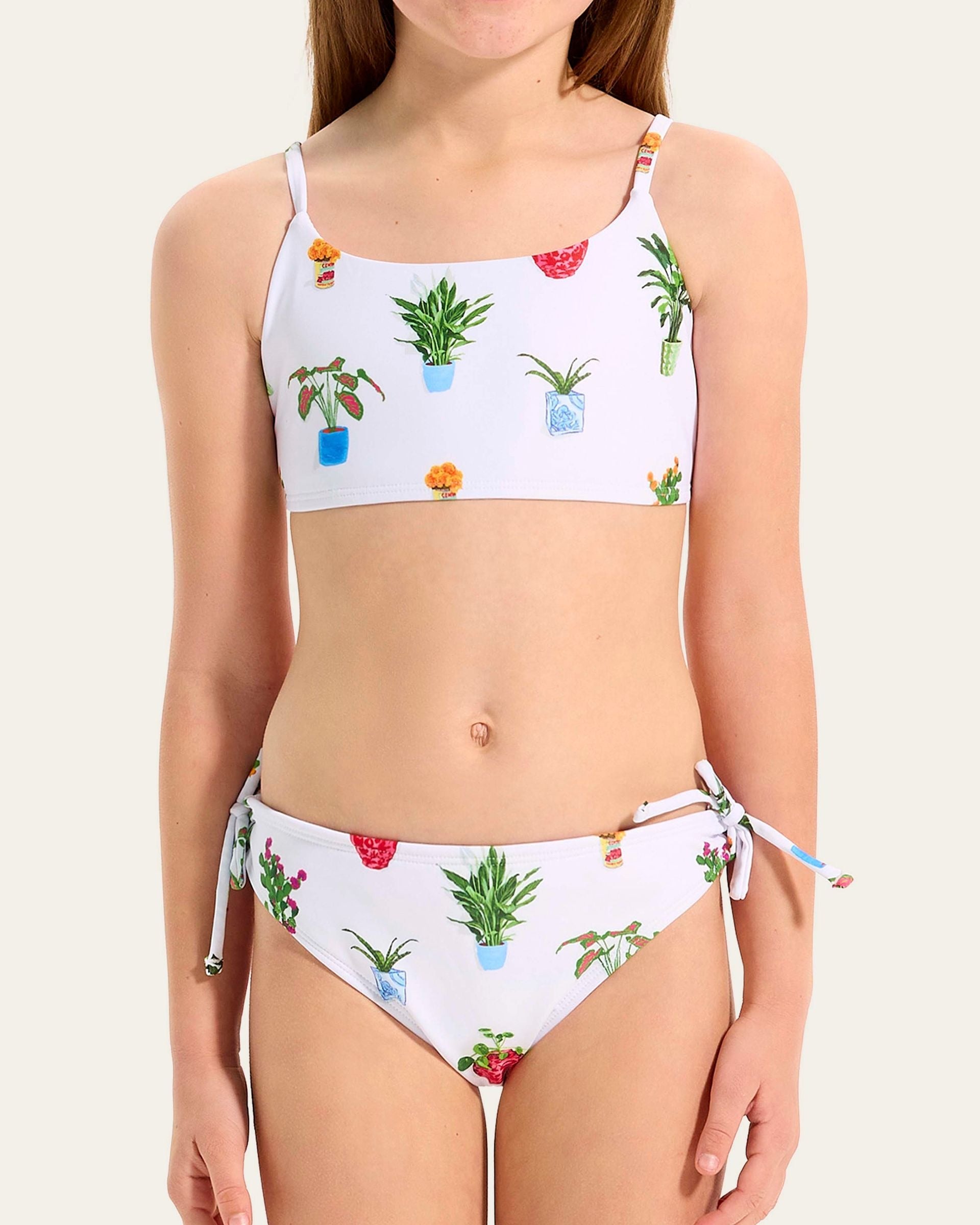 Girls Playa Bonita set features a crop top, adjustable straps, adjustable tie back, coordinating hipster pant, and is fully lined