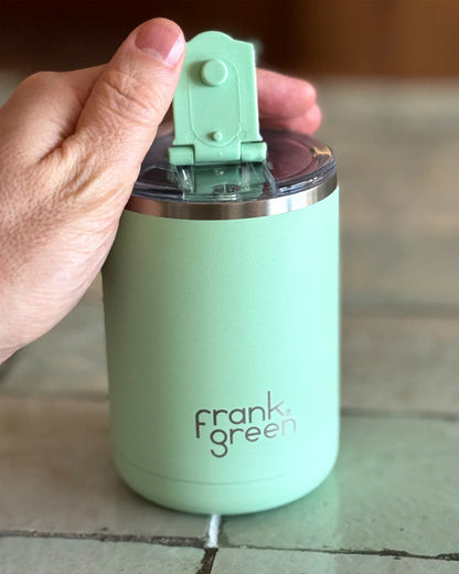 A Gift Set featuring two signature frank green products! Contains a 12oz/355ml Ceramic Reusable Cup with hinge lid and a 34oz/1,000ml Ceramic Reusable Bottle with flip lid.