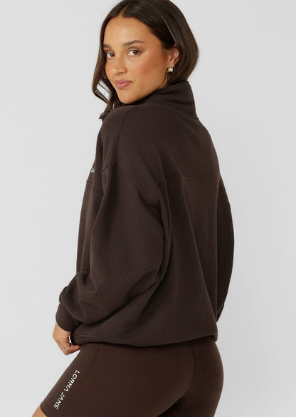 Versatile Relaxed Fit Layering Piece
1/4 Zip Front Closure
Transseasonal Cotton Terry Fabric
Elevated Logo Embroidery