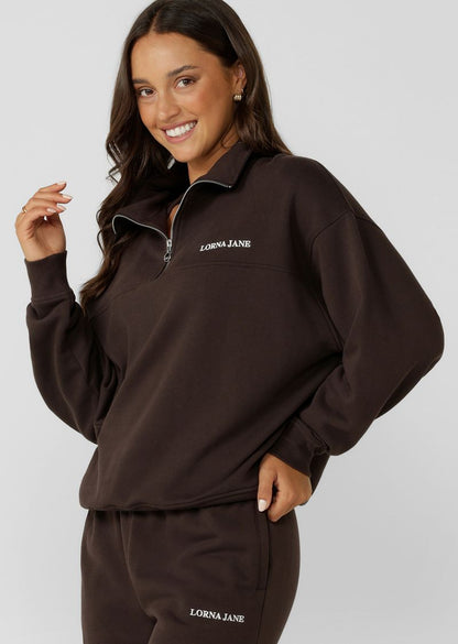 Versatile Relaxed Fit Layering Piece
1/4 Zip Front Closure
Transseasonal Cotton Terry Fabric
Elevated Logo Embroidery