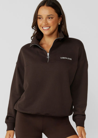 Versatile Relaxed Fit Layering Piece
1/4 Zip Front Closure
Transseasonal Cotton Terry Fabric
Elevated Logo Embroidery