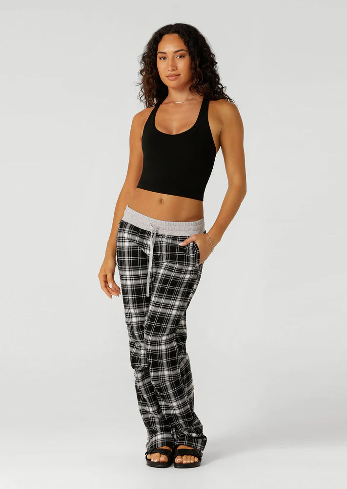 Built in Shelf Bra with Removable Padding for All Day Support
Form Flattering Cropped Fitted Silhouette
Supportive Racerback Silhouette Clears the Shoulder Blades